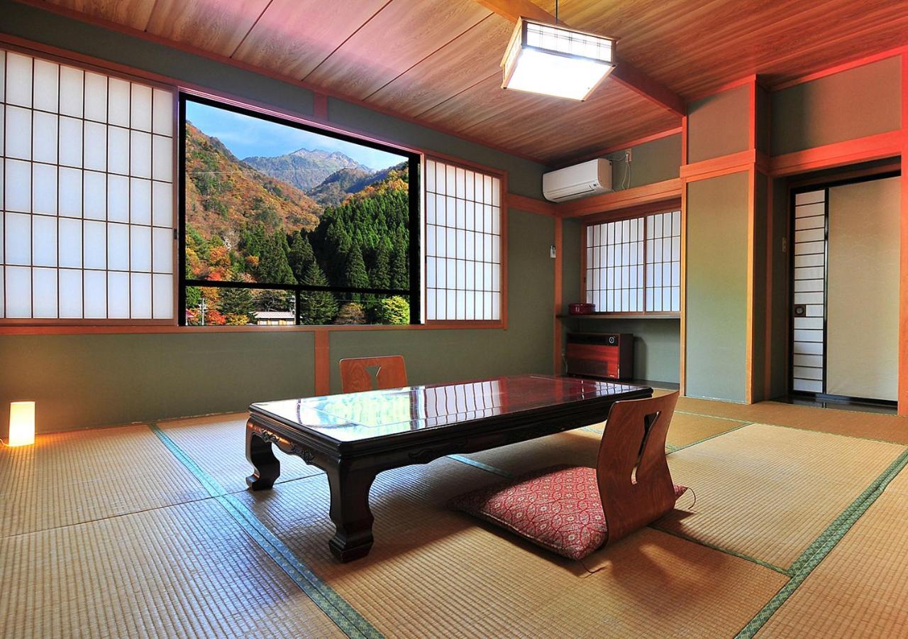 筋肉と自然と遊ぶ宿 田島館 Takayama  Bagian luar foto